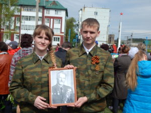 Лидеры клуба с портретом А.И. Дырина в акции "Бессмертный полк"